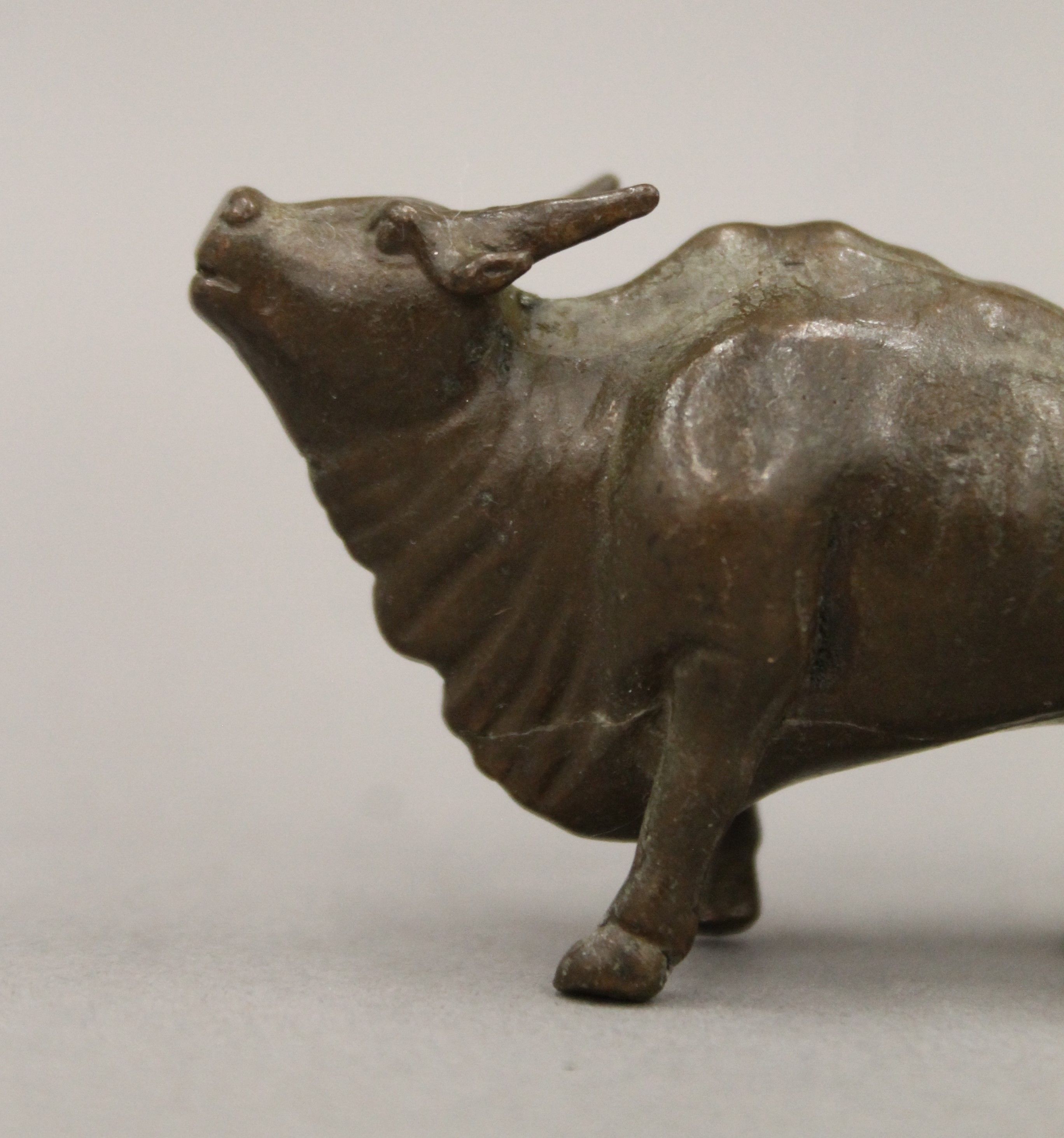 A bronze model of a bull. 7.5 cm long. - Image 2 of 4