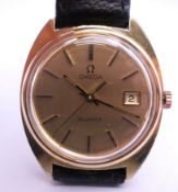 A gold plated gentleman's Omega wristwatch. 3.5 cm wide.
