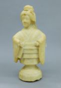 A 19th century carved marble model of a Geisha. 31 cm high.