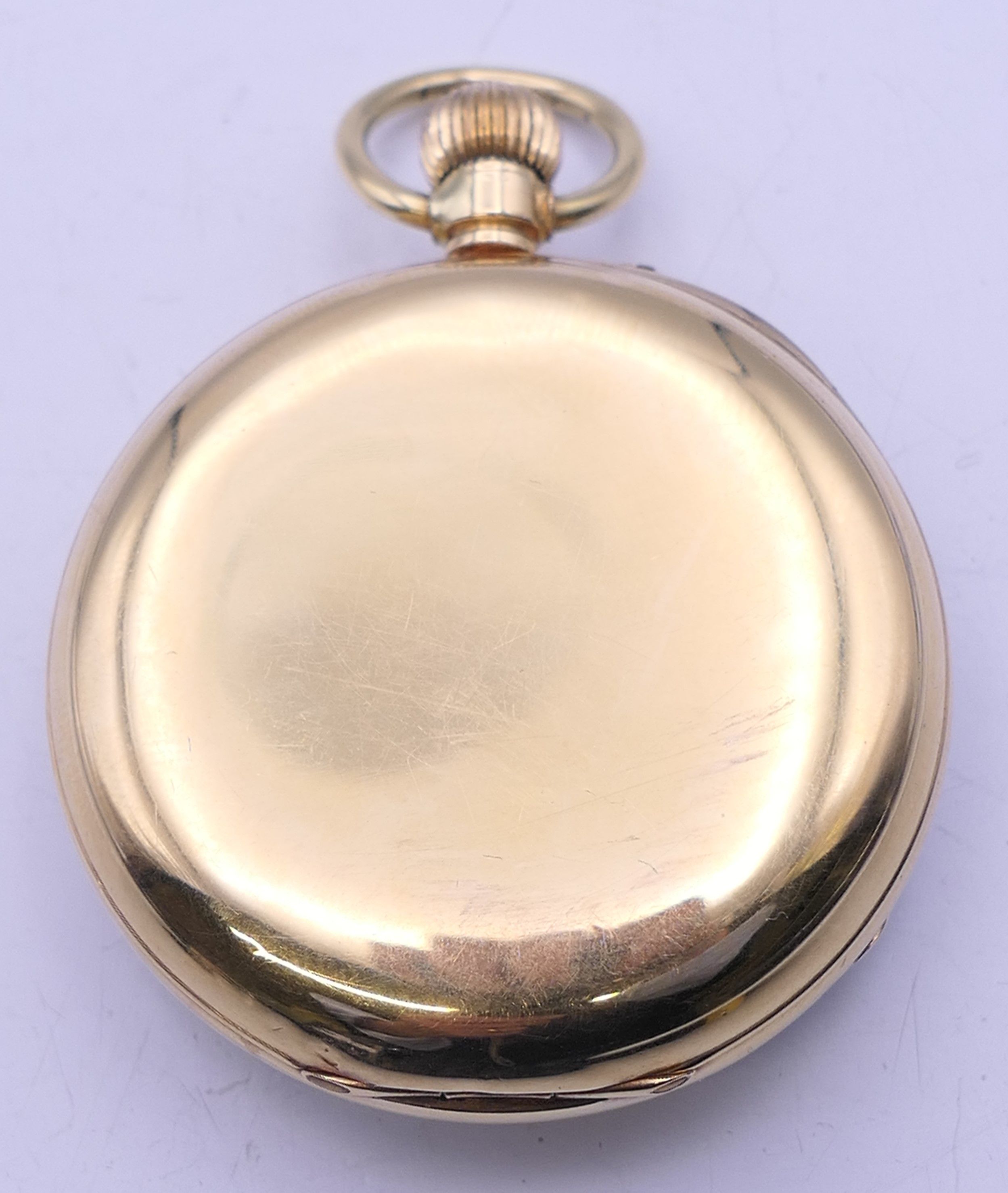 An 18 ct gold pocket watch with florally engraved dial, serial number 15514. 4.25 diameter. - Image 3 of 8