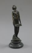 An Art Nouveau style bronze model of a girl. 19 cm high.