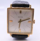 A 9 ct gold Vertex gentleman's wristwatch. 2.75 cm wide. 26.2 grammes total weight.