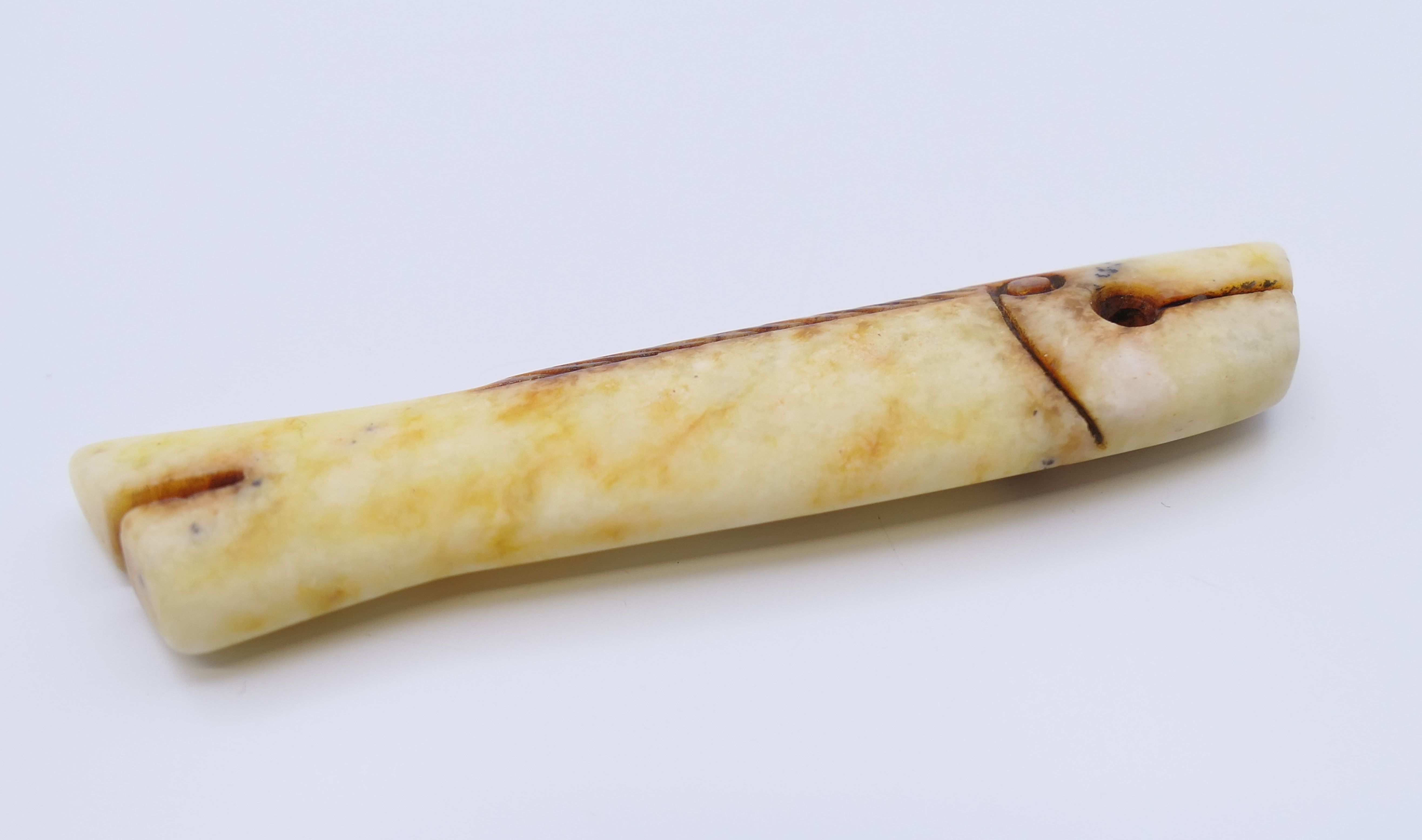 A small Chinese russet jade coloured fish, Shang Dynasty. 7.5 cm long. - Image 4 of 4