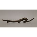 A bronze model of an antelope. 19.5 cm long.