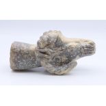 A Chinese white and grey jade rams head, Han Dynasty. 9.5 cm long.