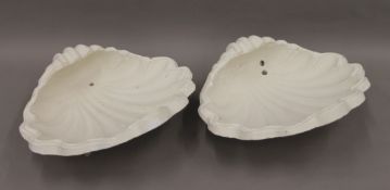 A pair of plaster wall shells. 34 cm high.