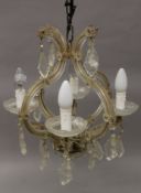 A Venetian glass chandelier. Approximately 45 cm high.