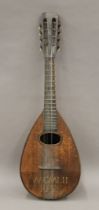 A vintage mandolin. 59 cm long.