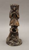 A Blackforest carved wooden model of a fox dressed as a monk. 26.5 cm high.