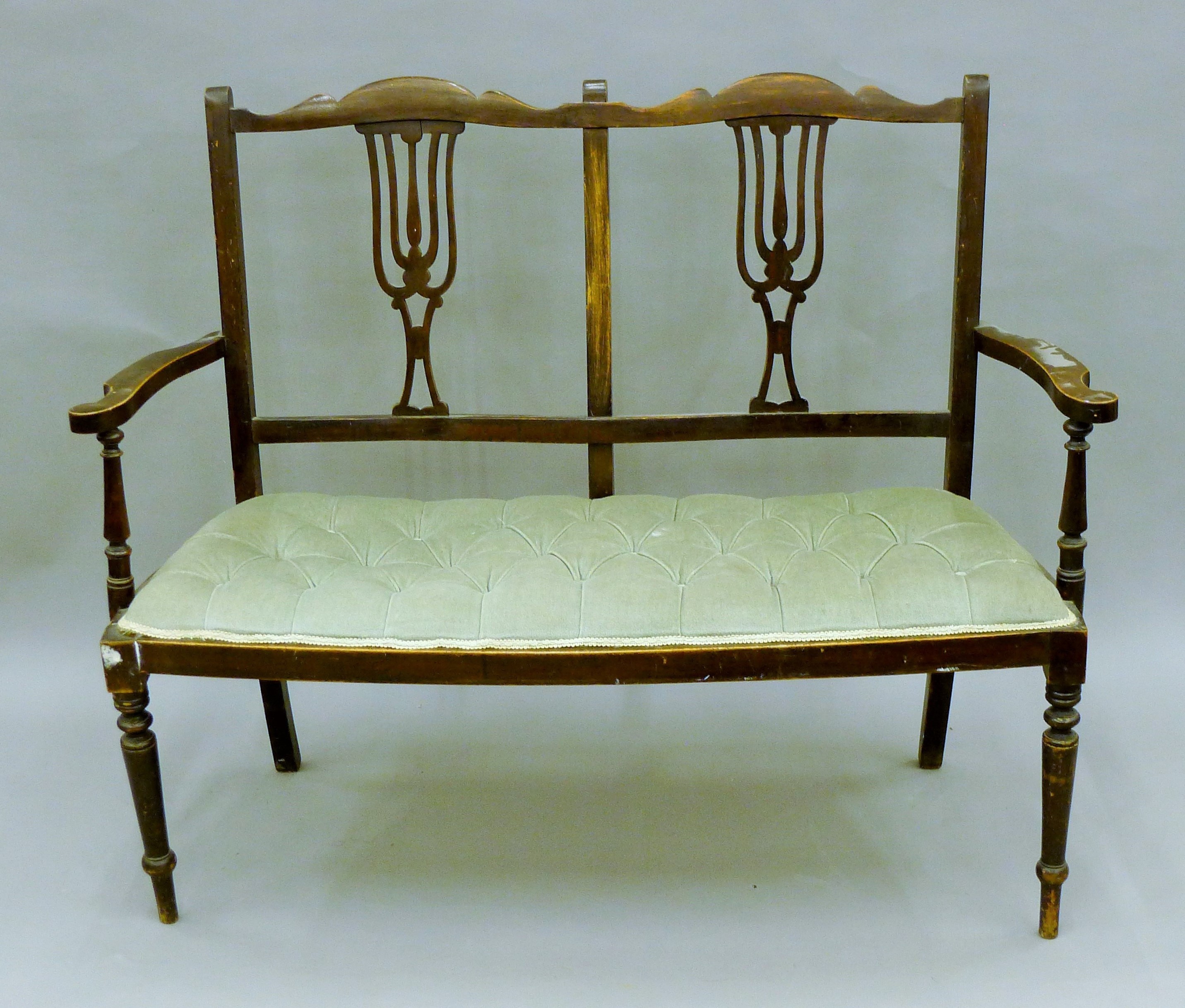 An Edwardian salon settee, a quantity of various chairs and an oak gramophone cabinet.