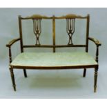 An Edwardian salon settee, a quantity of various chairs and an oak gramophone cabinet.