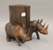 A pair of carved bookends formed as rhinos. 18 cm high.