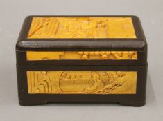 A Chinese carved wooden rectangular box. 15 cm long.