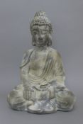 A distressed resin Buddha. 52 cm high.