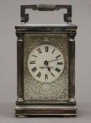 A Mappin & Webb silvered brass carriage clock commemorating The Royal Wedding of Prince Charles and