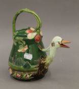 An Austrian porcelain ewer, the sprout formed as a bird's beak. 21 cm high.