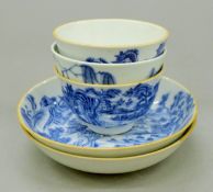 Three 19th century blue and white porcelain tea bowls and two saucers. The tea bowls 7.