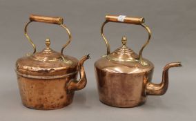 Two Victorian copper kettles. The largest 25 cm high.