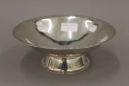 A beaten 925 silver bowl, the centre decorated with an eagle,