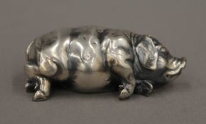 A silver model of a pig, bearing Russian marks. 7 cm long. 41.9 grammes total weight.