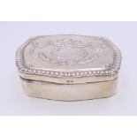 An embossed silver jewellery box. 10 cm wide.