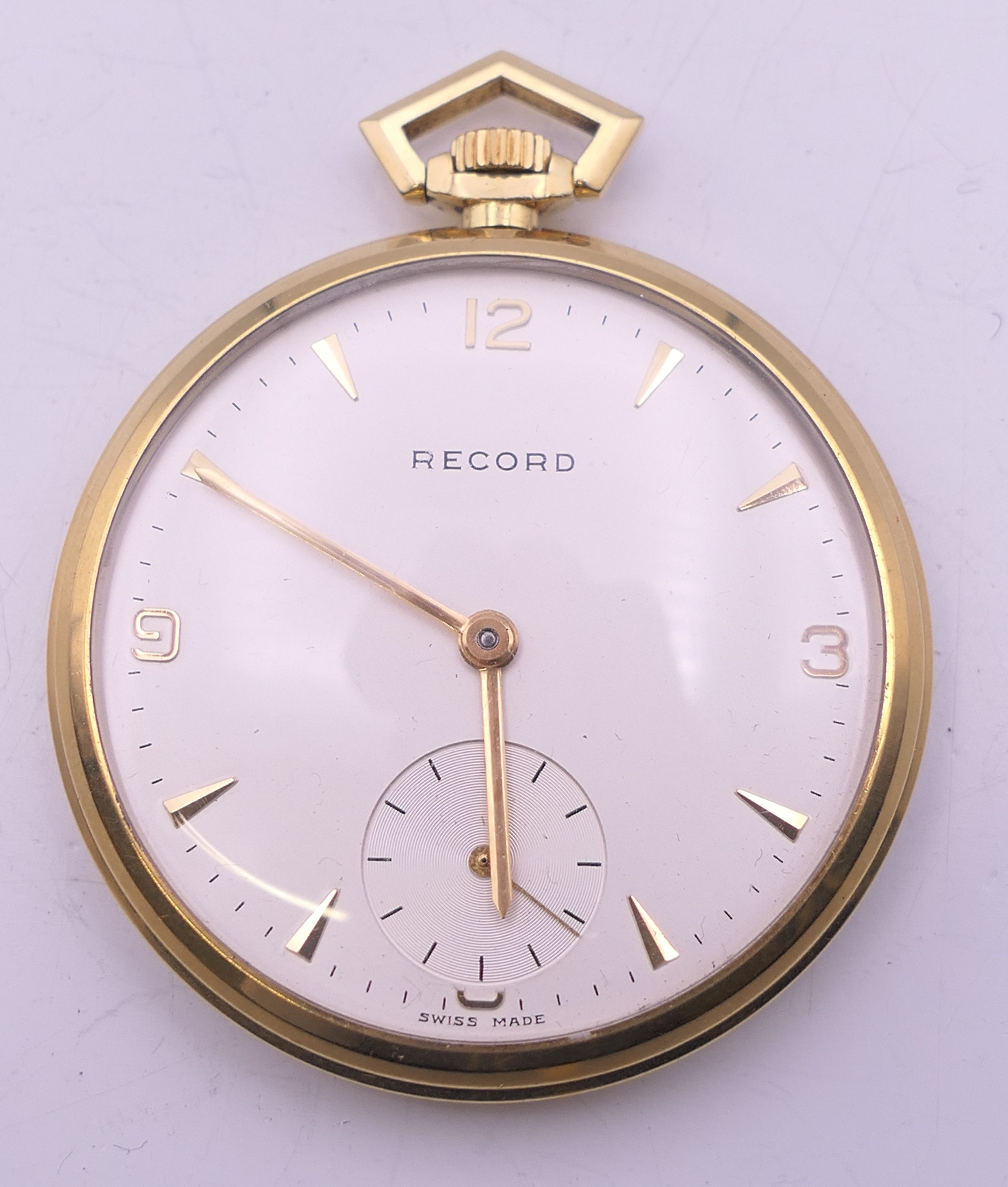 A 14 ct gold Record pocket watch. 4.5 cm diameter. 53.8 grammes total weight.
