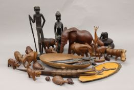 A quantity of African carvings.