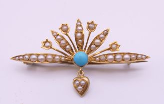 A Victorian 15 ct gold turquoise and seed pearl brooch. 4 cm x 2.25 cm. 3.7 grammes total weight.