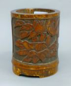 A Chinese bamboo brush pot. 15 cm high.