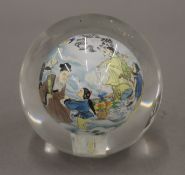 A Chinese inside painted glass ball, signed. 9.5 cm high.
