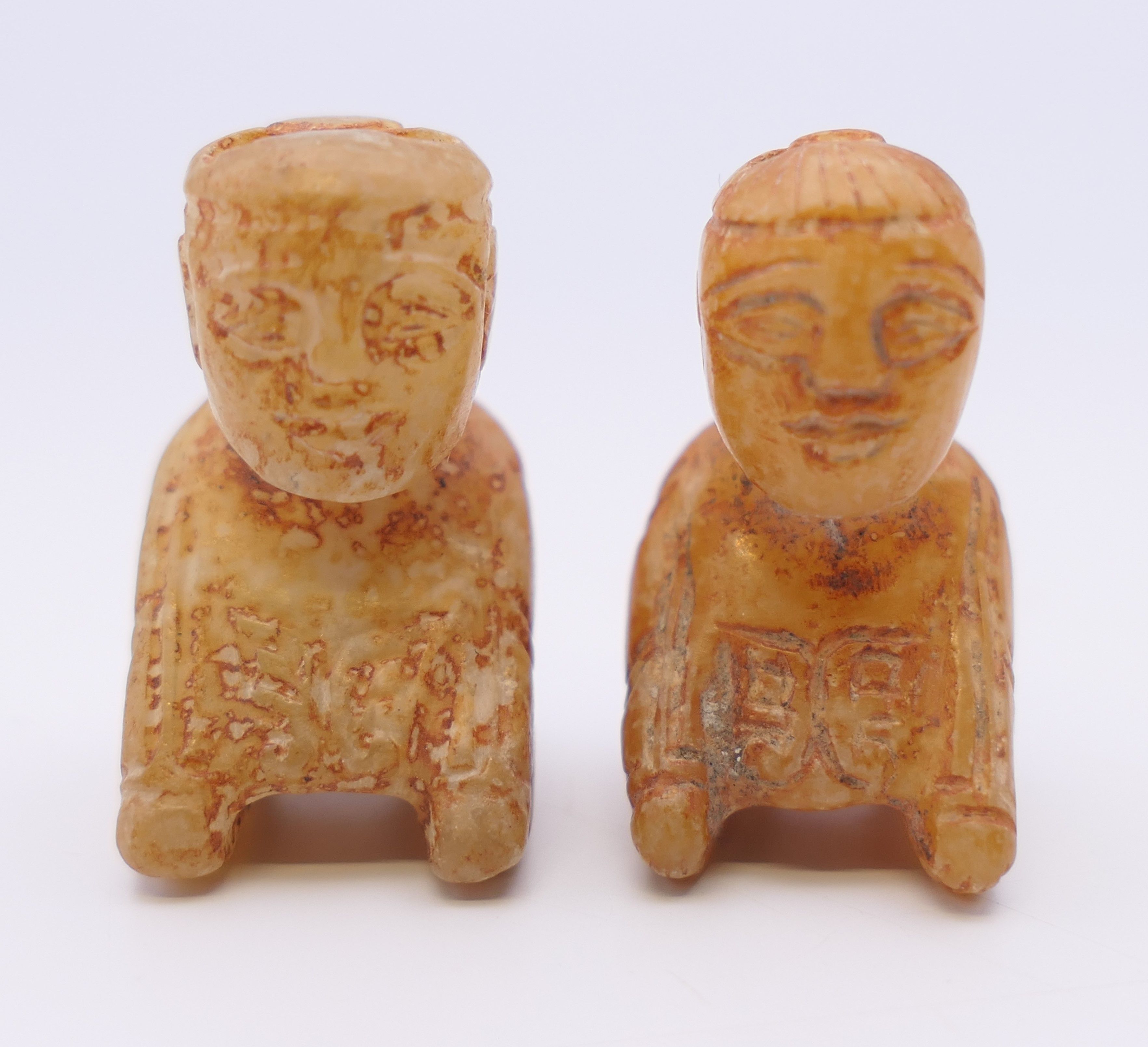 A Chinese jade standing male figure, together with two smaller kneeling male figures, Han Dynasty. - Image 8 of 11