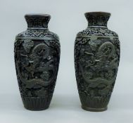 A pair of Chinese vases. 24 cm high.