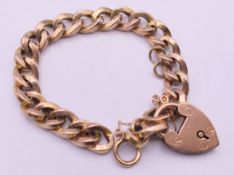 A 9 ct gold bracelet with padlock fastener (links detached). 16.5 cm long. 15.9 grammes.