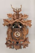 A cuckoo clock. 42 cm high.
