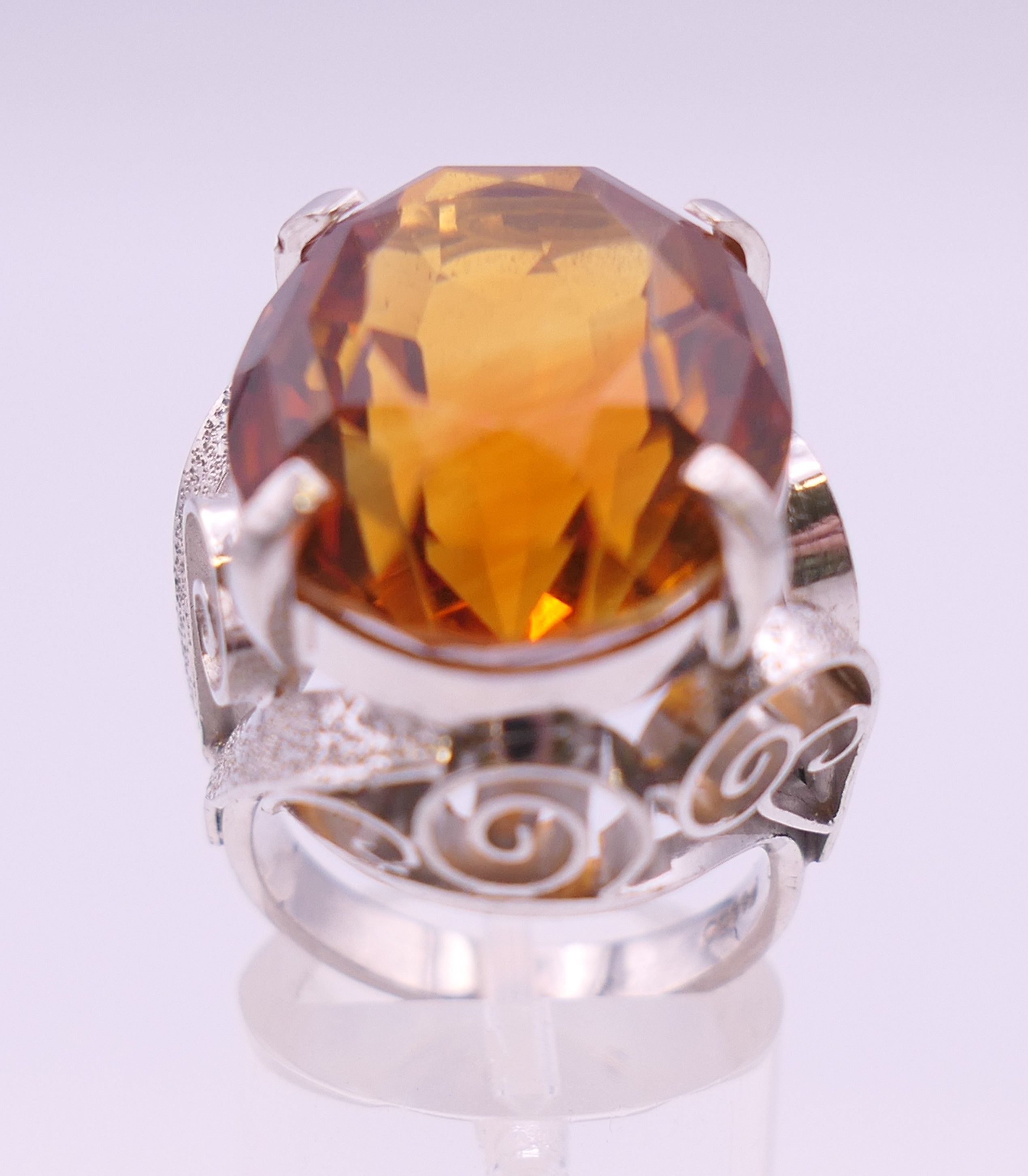 A platinum Madeira citrine ring. Citrine 2.5 cm x 1.5 cm. Ring size N/O. 20.8 grammes total weight. - Image 3 of 8