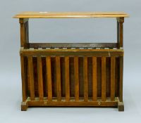 A brass inlaid teak canterbury. 51.5 cm wide.