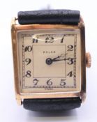 A 9 ct gold Rolex wristwatch, inscribed to back Reuben G Crossley 3.7.25. 2.25 cm wide. 22.