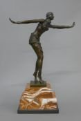 An Art Deco style bronze model of a girl on a marble plinth base. 49 cm high.