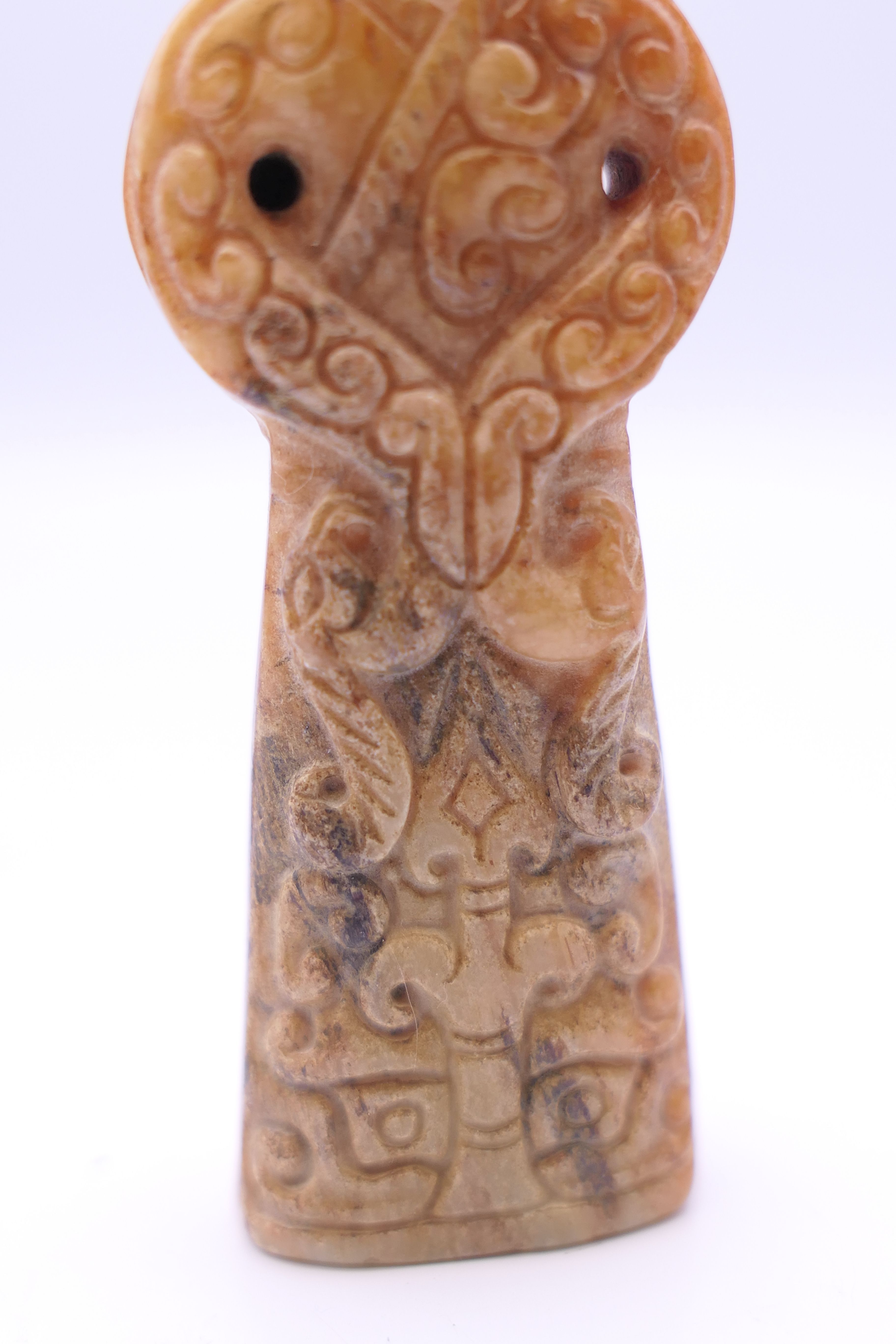 A Chinese jade standing male figure, together with two smaller kneeling male figures, Han Dynasty. - Image 6 of 11