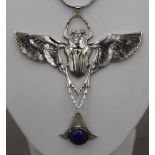 A silver and lapis scarab pendant necklace. The pendant 8.5 cm wide.