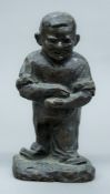 A bronze figure of a man, signed Viareggio. 20.5 cm high.