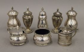 A quantity of silver cruets. The largest 8 cm high. 179.9 grammes.