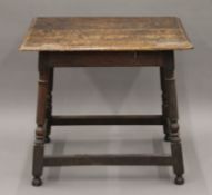 A 19th century oak side table. 68 cm wide.