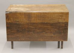 A 19th century oak gate leg table. 104 cm long.