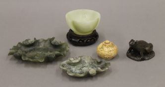 A Chinese jade bowl on stand, a hardstone frog, a small pot and two other jade items. The former 9.