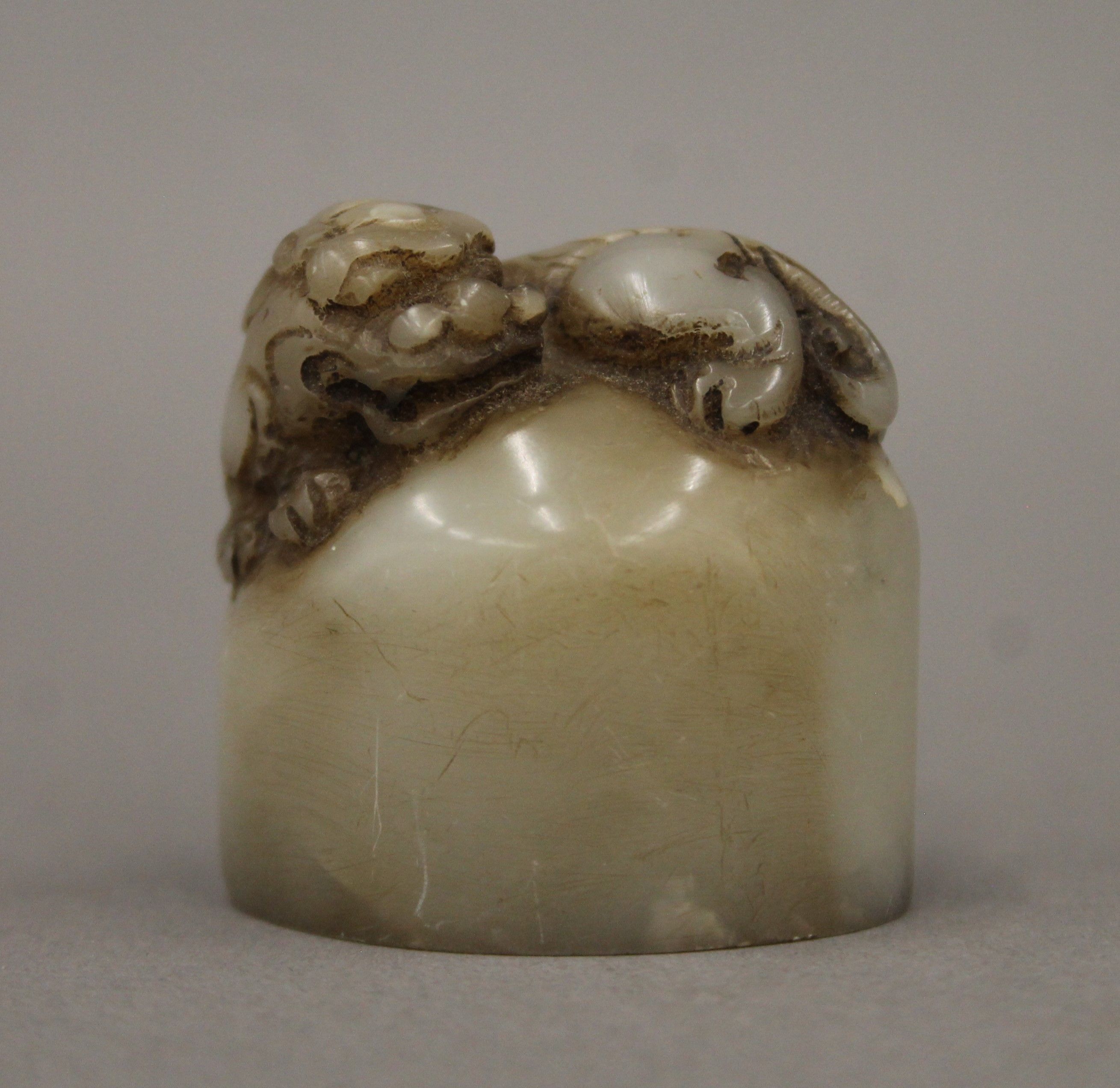 A small soapstone seal. 3.75 cm high.