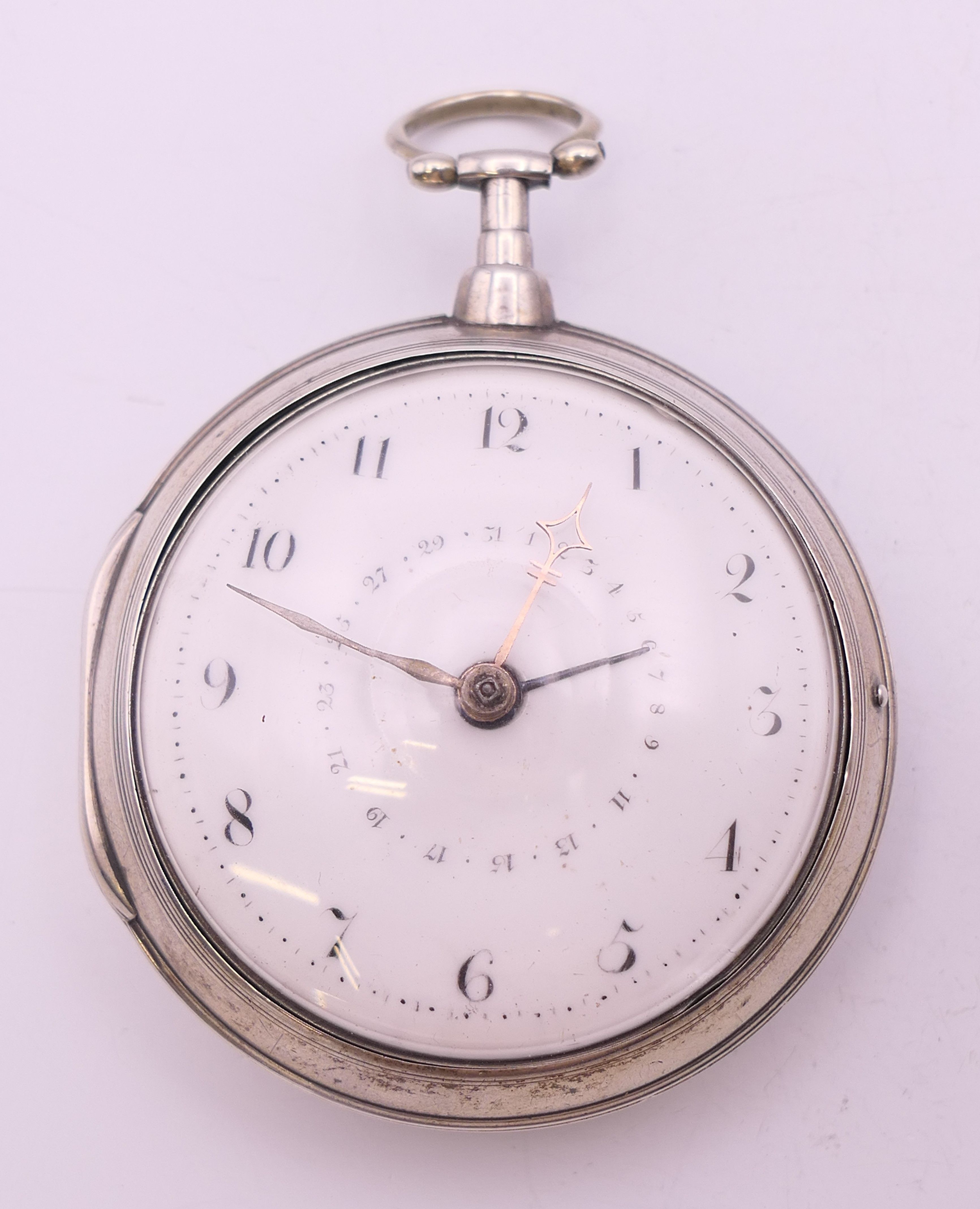 A Jacob Sumpter Dook silver pair cased pocket watch, the movement with engraved Masonic emblem. 5.