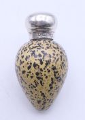 A Victorian silver mounted McIntyre porcelain scent bottle formed as a bird's egg, numbered 20772.