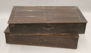 Two early 20th century oak under bed storage boxes. 113 cm long.