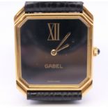 An 18 K gold Gabel wristwatch. 2.75 cm wide. 36.2 grammes total weight.